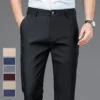 Pantalones elásticos para hombre, pantalón informal de secado rápido, color negro sólido, estilo coreano, para oficina, novedad, primavera y otoño